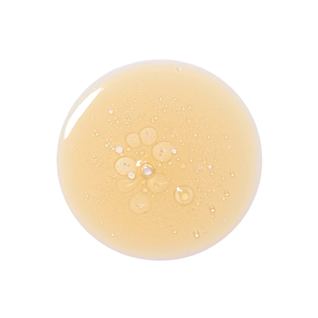 Photographie de texture d'un serum de couleur orange - Photographe cosmetiques - photographe texture cosmetiques - photographe produits cosmetiques - Aurore Aivrest