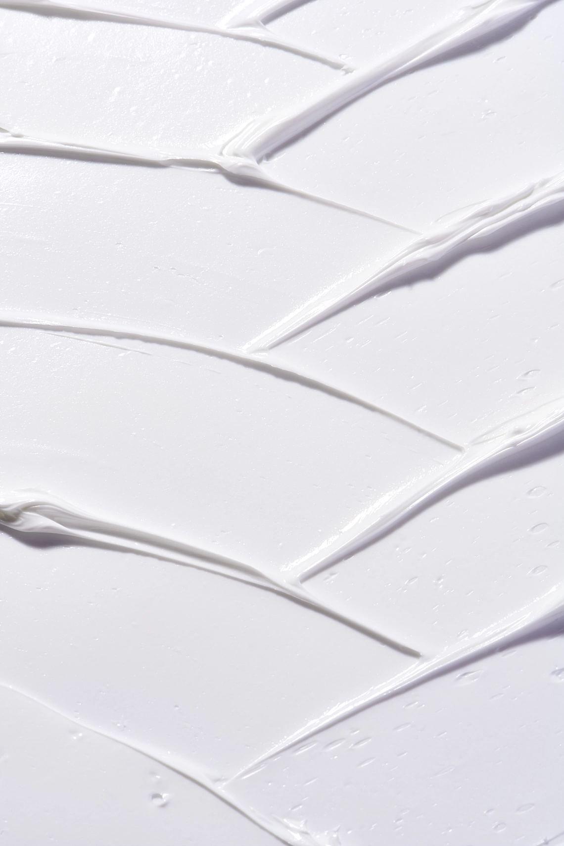 Photographie de texture d'une crème pour le corps de couleur blanche - Photographe cosmetiques - photographe texture cosmetiques - photographe produits cosmetiques - Aurore Aivrest